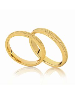 two 3mm yellow gold bands with a recessed pattern through centre